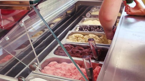 Gelato Artisan Serving Ice Cream
