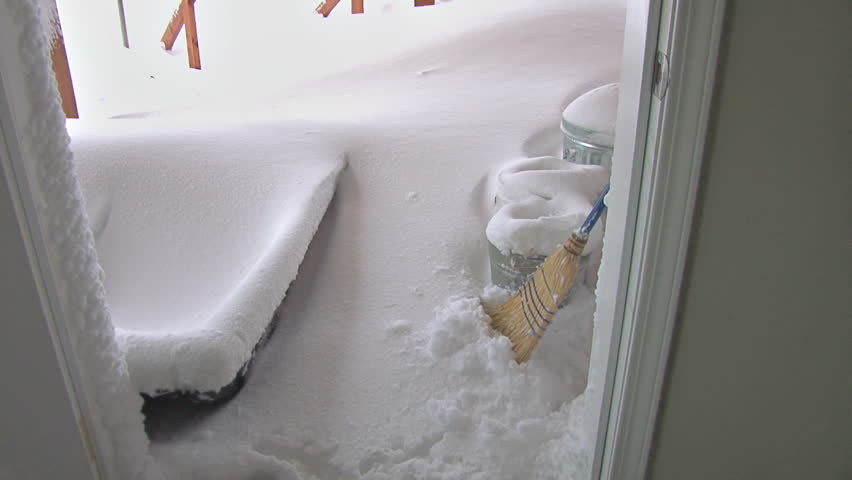Digging Out of House Snow Shovel on Deck Blizzard