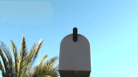 Female checks her mailbox - angle 5, HD 1080i