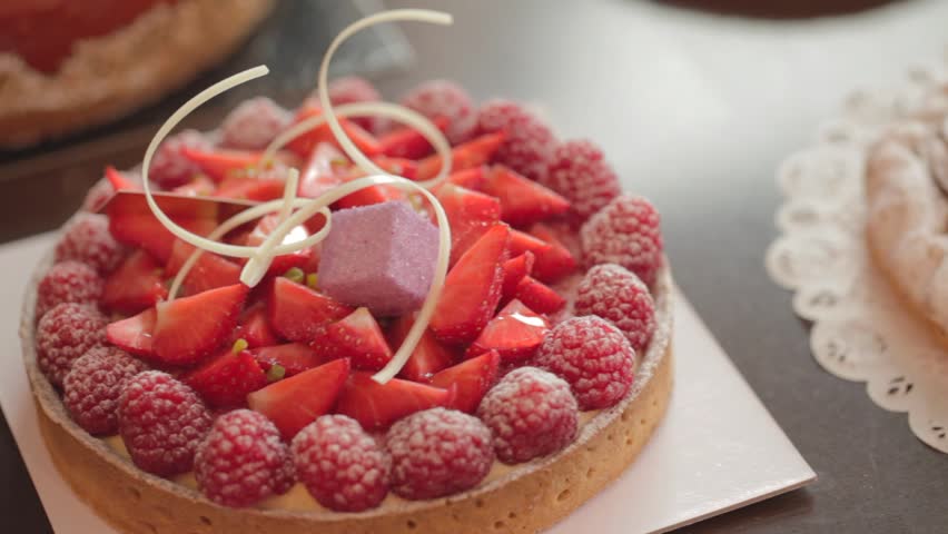 Pan over strawberry/raspberry tart
