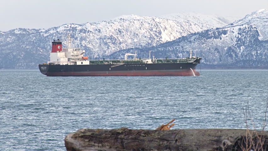 HOMER, AK - CIRCA 2012: Oil tanker at anchor pumping bilge.