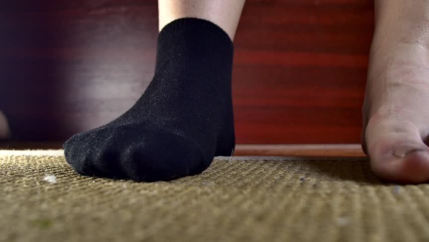 Taking off socks