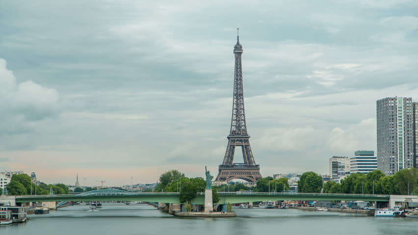 The Statue of Liberty and the Eiffel Tower Timelapse. View from Mirabeau bridge before sunset. Paris, France | Shutterstock HD Video #31323334