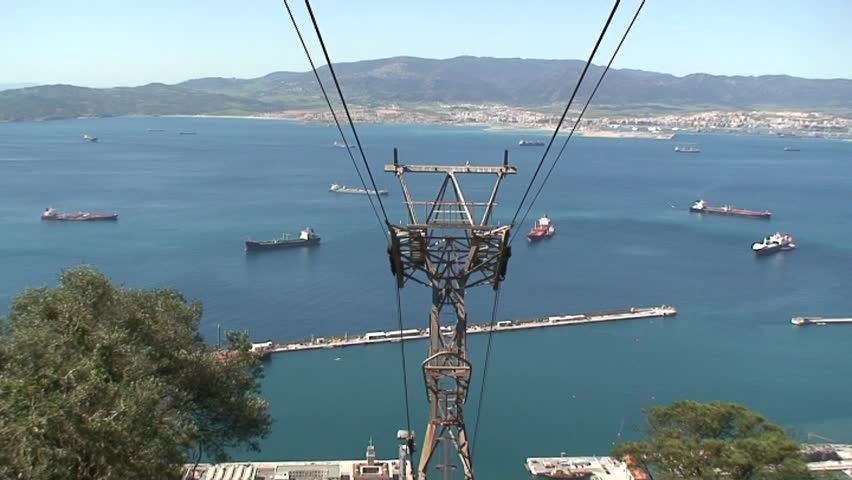 Cable car arriving at the top of Gibraltar with views to Spain