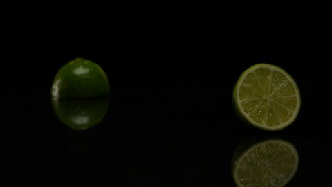 Lime rolls out on a black table