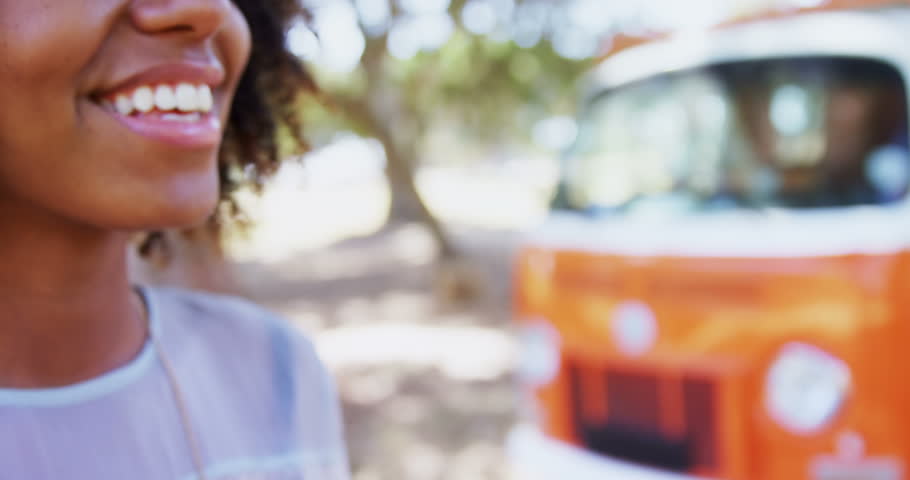 Happy woman in blue eye lashes at music festival 4k