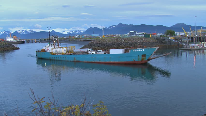 HOMER, AK - CIRCA 2012: Laden industrial-strength landing craft entering harbor