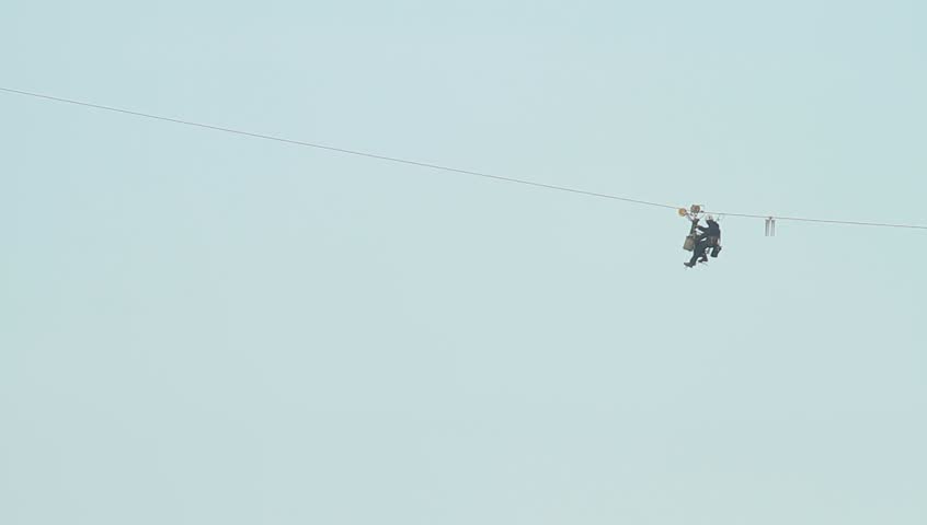 Man at work on a wire 