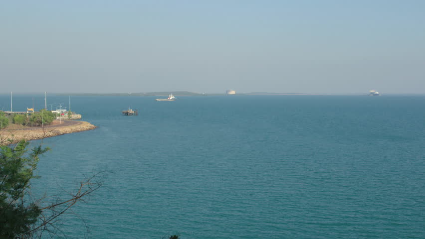 Timelapse in the afternoon of an active Port Darwin looking south from Bicentennial Park, Darwin, Northern Territory, Australia