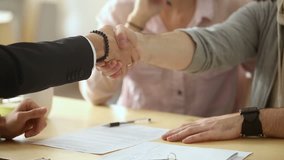 Couple sign mortgage contract, put signature on sale purchase rental agreement, handshaking realtor at meeting with estate agent, satisfied customers buy property, get keys of new home, close up view - Powered by Shutterstock - Get 15% off with code: PIKWIZARD15