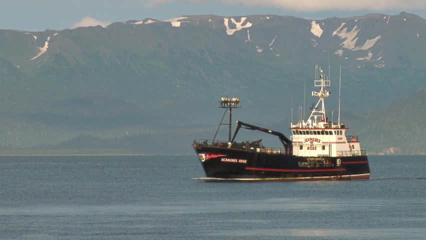 HOMER, AK - CIRCA 2012: Big crabbing boat on calm bay waters.