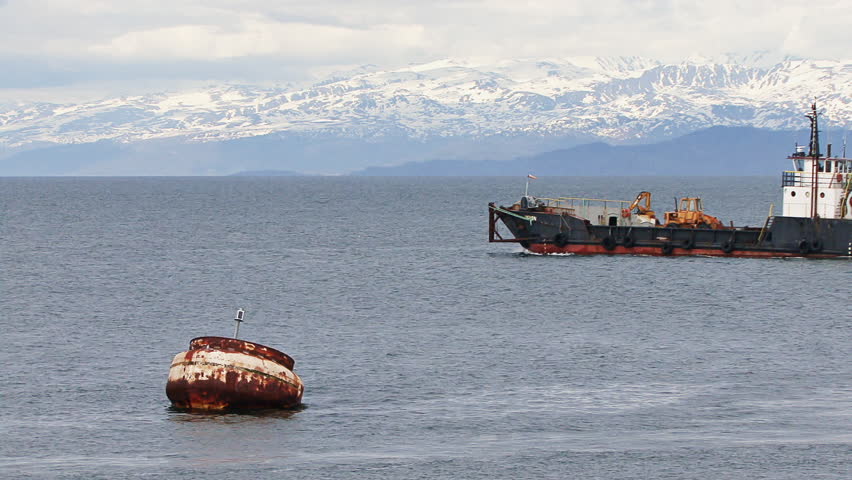 HOMER, AK - CIRCA 2012: Large industrial landing craft leaving Homer Harbor