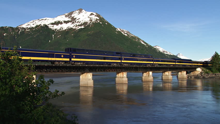 WHITTIER, AK - CIRCA 2012: Alaska Railroad Passenger Tour Train crossing over 20