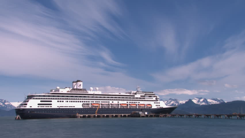 HOMER, AK - CIRCA 2012: A docked cruise ship awaits the last of the returning