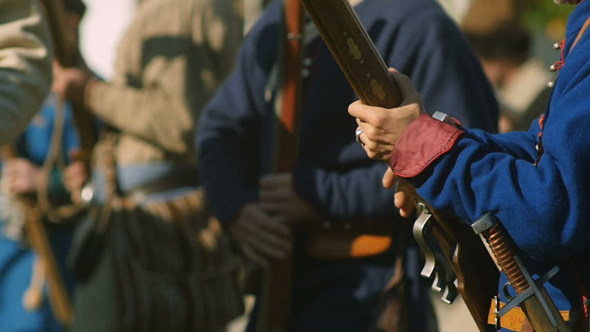  Cocks the shotgun. Muzzleloader firing in Slow motion. Filmed at 96 fps