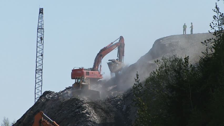 HOMER, AK - CIRCA 2012: A massive road construction project involving two large