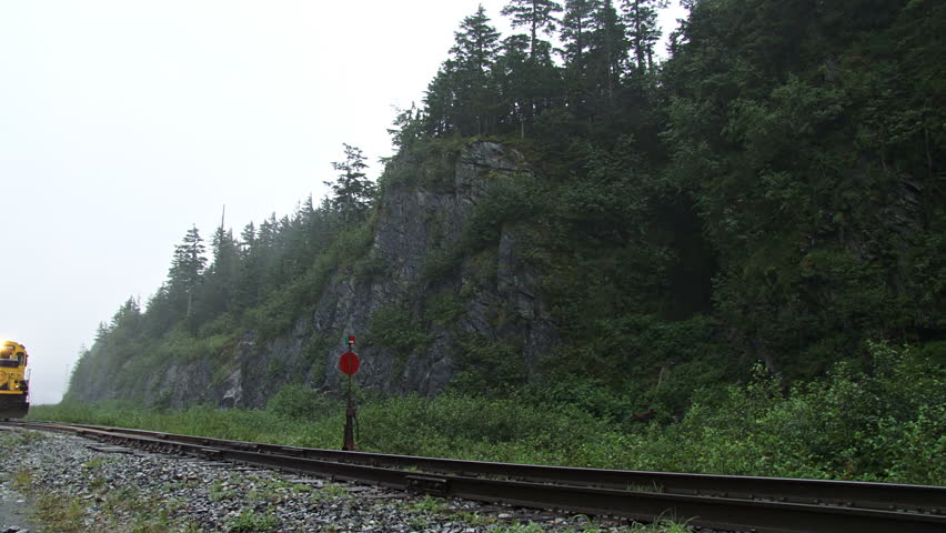 WHITTIER, AK - CIRCA 2012: Low angle shot with sound of Alaska Railroad tour