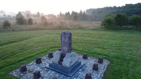 Footage of drone flight above monument (1813 year built) near the Spaso-Borodinsky monastery in Shevardino village from the birds sight, Moscow region, Mozhaysk district, Russia