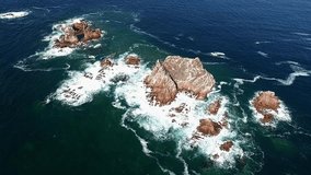 waves and the rocks. Aero video from drone