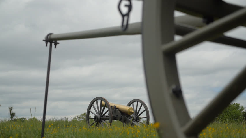 VIRGINIA - MAY 2017 - Civil War 150th anniversary.  Memorial, monument on Civil War Battlefield.  Brass / Bronze cannon on carriage on display on battlefield.  Virginia Battlefield.  National Park.