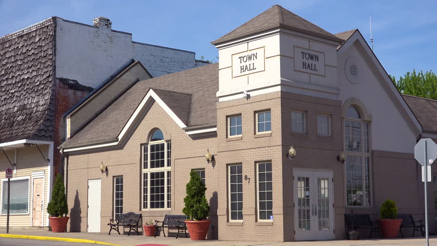 CIRCA 2010s - United States - Generic establishing shot of a town hall or city hall building in a small town.