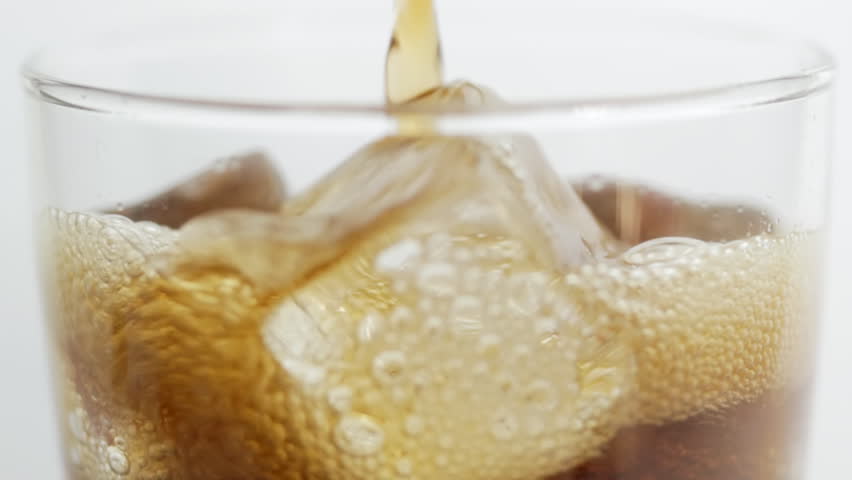 Pouring cola over ice