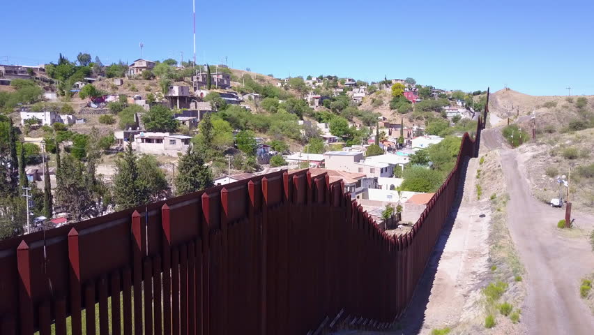 CIRCA 2010s - U.S.-Mexico border - A view along the US Mexico border at Nogales, Arizona.