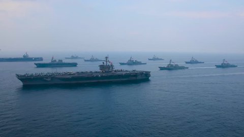 CIRCA 2010s - An aerial over the U.S. Carl Vinson strike group moving across the Sea of Japan.