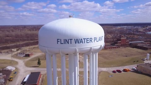 CIRCA 2010s - Flint, Michigan - Aerial over the Flint Michigan water tanks during the infamous Flint water crisis.