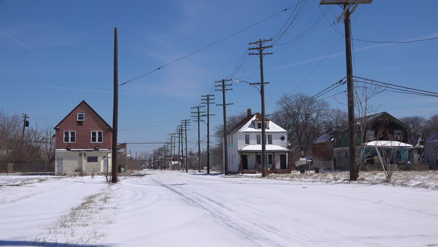 CIRCA 2010s - Detroit, Michigan - A snowy stret in a ghetto section of downtown Detroit, Michigan.