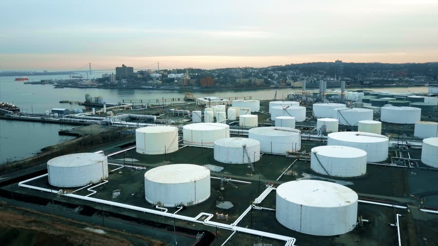Aerial view of storage tanks at oil refinery 4K