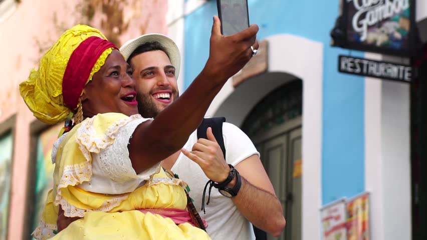 Taking a Selfie with Brazilian Woman - "Baiana" in Pelourinho, Bahia Royalty-Free Stock Footage #31385902