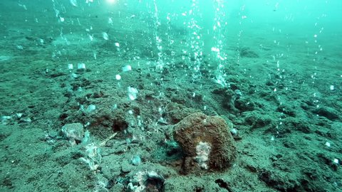 Hot bubbles rising from underwater volcano beneath ocean floor, Pulau Weh, Aceh, Indonesia 