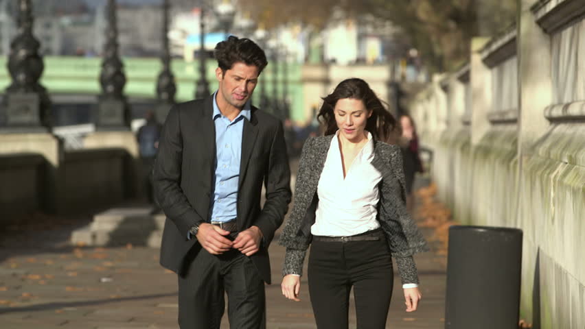 Attractive Young Professional Couple Walking Stock Footage Video (100%