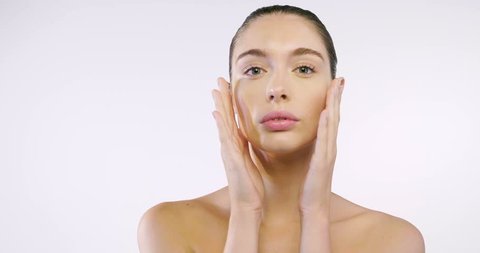 Beautiful girl uses creams for the beauty of her face and body. daytime and night-time concept for fresh and moisturized skin