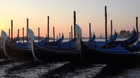 Gondolas closeup at dawn. Venice, Italy
