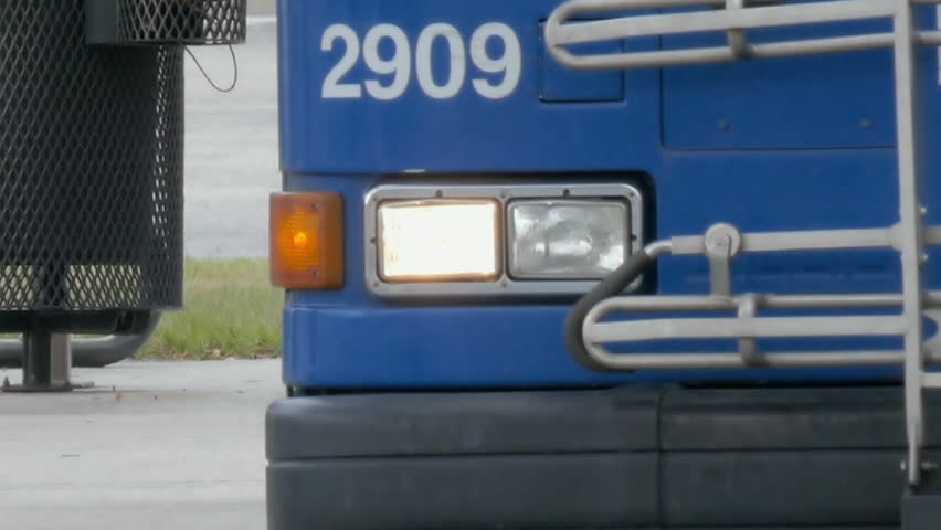 Passengers taking the city bus public transportation  