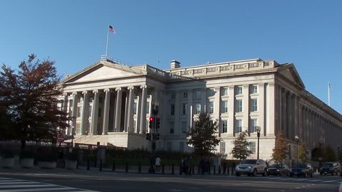 WASHINGTON, DC. - CIRCA OCT 2011: United States Treasury Department building, the oldest departmental building in DC, is at the busy corner of 15th Street and Pennsylvania Avenue, near White House.