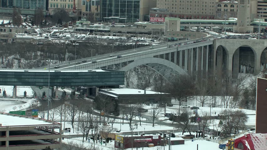 A time lapse shot of traffic passing over the Rainbow Bridge from America into