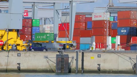 PORT OF ROTTERDAM, THE NETHERLANDS - SEPTEMBER 15, 2017: Electricity powered automated guided vehicle for moving containers in Rotterdam World Gateway container terminal