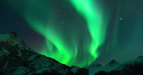 Time lapse clip of Polar Light or Northern Light (Aurora Borealis) in the night sky over the Lofoten islands in Northern Norway in winter.