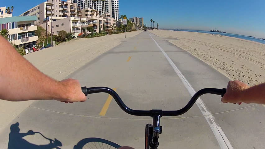 LONG BEACH - NOV 12: The point of view of someone riding a bike on the beach