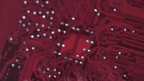 Computer circuits hardware footage. Motherboard parts, chips, connections, circuit boards visible. - Powered by Shutterstock - Get 15% off with code: PIKWIZARD15