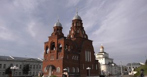 4K high quality video footage view of red brick stone beautiful church in historical center of medieval town Vladimir on Golden Ring route some 200 km from Moscow, Russia on summer day