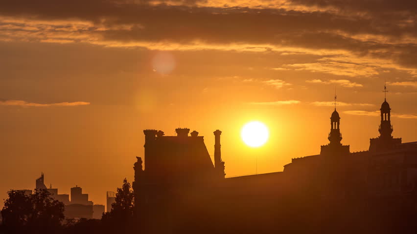 Sunset near Pont des Arts in Paris timelapse from Pont Neuf, France. Ship on the River Seine near square of the Vert-Galant
