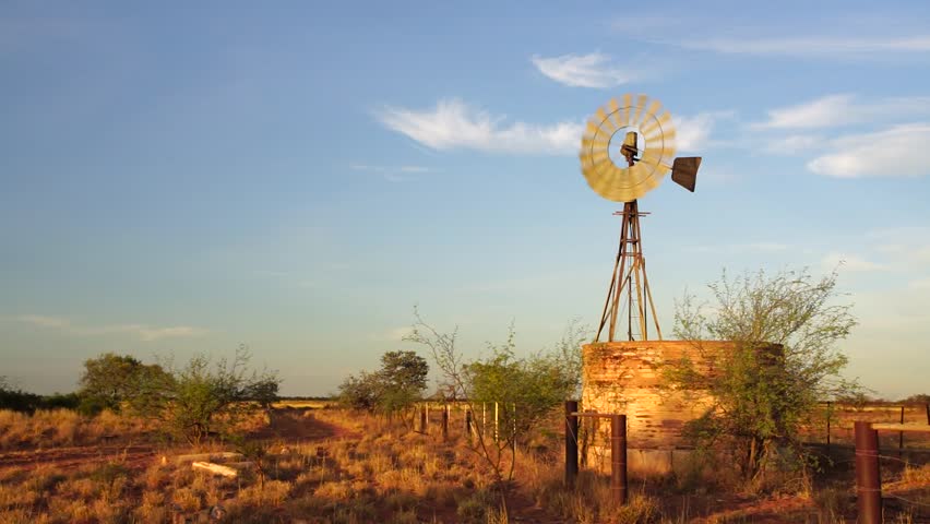 Windmill in Australian outback. This windmill is found in the Pilbara region of Western Australia near Marble Bar. Royalty-Free Stock Footage #31471408