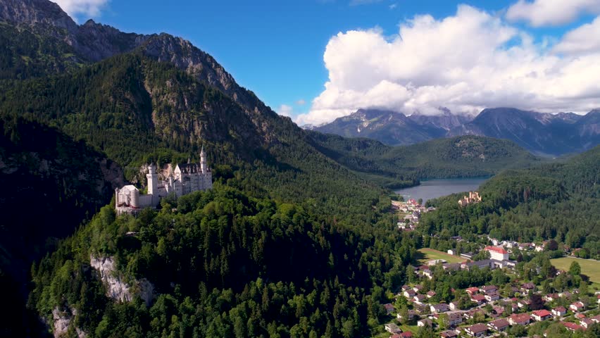 Neuschwanstein Castle Bavarian Alps Germany. Aerial FPV drone flights.