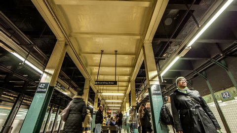 NEW YORK - CIRCA JULY 2012: timelapse of MTA 42nd street subway station platform with people waiting for train in Manhattan, New York City, NYC, USA