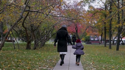 Young Woman Her Daughter Walks Around Stock Footage Video (100% Royalty