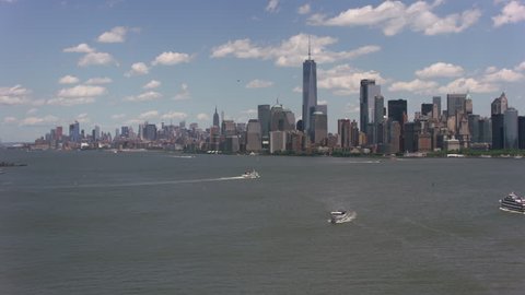 New York City, New York circa-2017, Flying by Statue of Liberty towards Manhattan. Shot with Cineflex and RED Epic-W Helium.